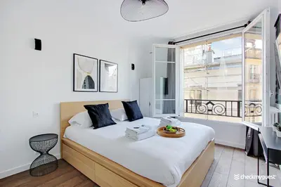 Un ou plusieurs lits dans un hébergement de l'établissement Charming apartment - 1BR-4P - Place des Vosges