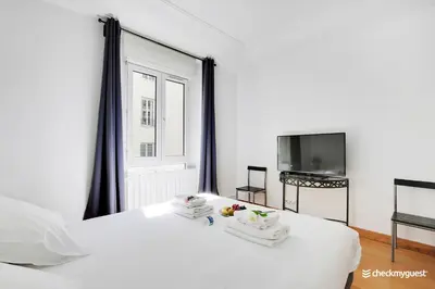 Un ou plusieurs lits dans un hébergement de l'établissement Fancy apartment - 2BR-6P - Gare de l'Est