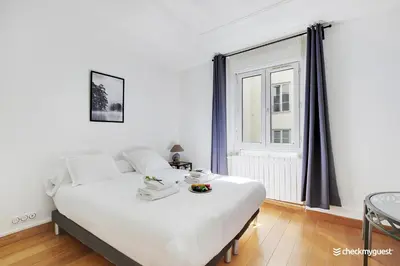Un ou plusieurs lits dans un hébergement de l'établissement Fancy apartment - 2BR-6P - Gare de l'Est