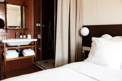 Un ou plusieurs lits dans un hébergement de l'établissement Hôtel Cabane - Orso Hotels