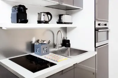 Cuisine ou kitchenette dans l'établissement Studios de Charme à Montmartre