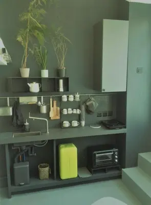 Cuisine ou kitchenette dans l'établissement Small arty studio Menilmontant