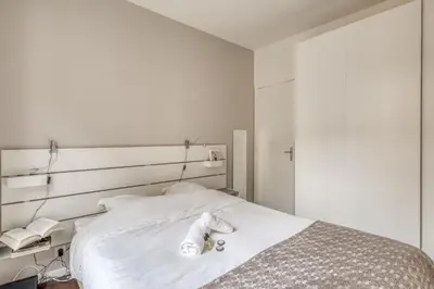 Un ou plusieurs lits dans un hébergement de l'établissement Charming Apartment close to Gare de Lyon