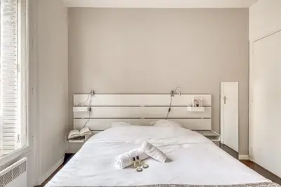 Un ou plusieurs lits dans un hébergement de l'établissement Charming Apartment close to Gare de Lyon
