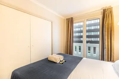 Un ou plusieurs lits dans un hébergement de l'établissement Paris Expo Apart Hotel - Porte de Versailles & Parking