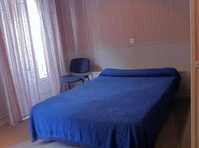 Un ou plusieurs lits dans un hébergement de l'établissement Hotel Des Arts