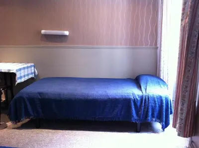 Un ou plusieurs lits dans un hébergement de l'établissement Hotel Des Arts
