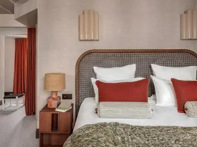 Un ou plusieurs lits dans un hébergement de l'établissement Hôtel Suzie Blue