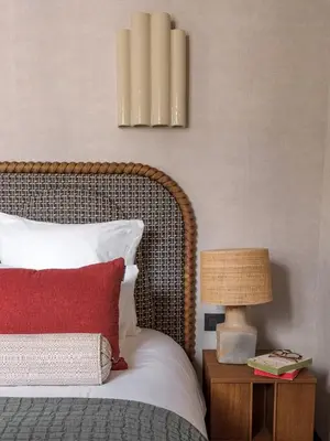 Un ou plusieurs lits dans un hébergement de l'établissement Hôtel Suzie Blue