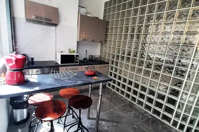 Cuisine ou kitchenette dans l'établissement Sweet Apartment in Paris Montmartre