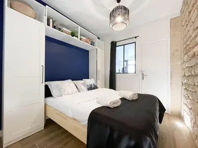Un ou plusieurs lits dans un hébergement de l'établissement LE GRACIEUX - MILORA INN - Central Paris