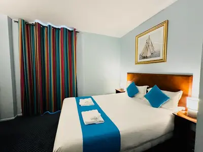 Un ou plusieurs lits dans un hébergement de l'établissement Hotel Bellevue Montmartre