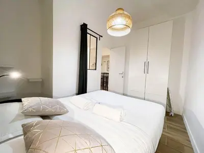 Un ou plusieurs lits dans un hébergement de l'établissement LA GRACIEUSE - MILORA INN - Central Paris