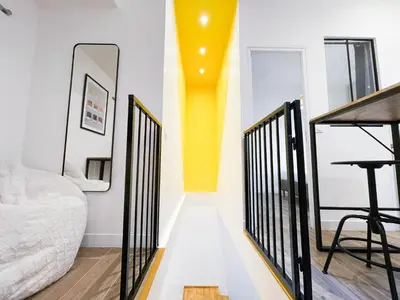 Un ou plusieurs lits dans un hébergement de l'établissement LA GRACIEUSE - MILORA INN - Central Paris