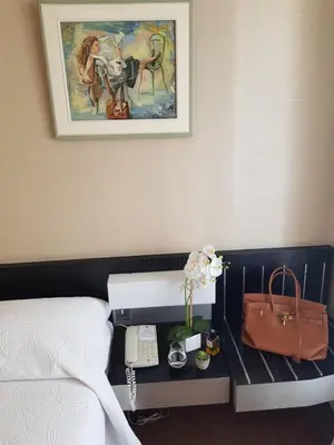 Un ou plusieurs lits dans un hébergement de l'établissement HOTEL ALISON
