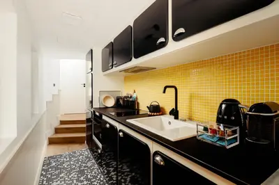 Cuisine ou kitchenette dans l'établissement My Maison In Paris - Louvre