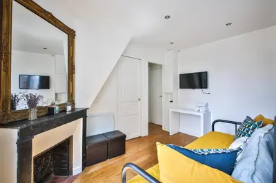 Télévision ou salle de divertissement dans l'établissement Cosy 4P FullEquiped/Jardin des Plantes/La Sorbonne