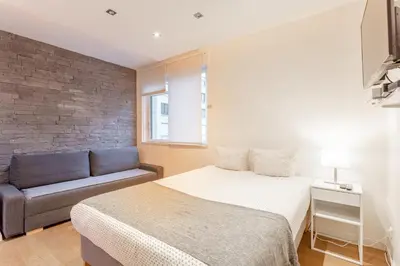 Un ou plusieurs lits dans un hébergement de l'établissement Victor Hugo Flat