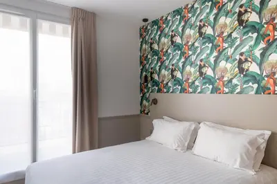 Un ou plusieurs lits dans un hébergement de l'établissement Hôtel 31 - Paris Tour Eiffel