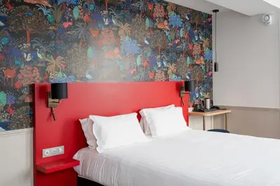 Un ou plusieurs lits dans un hébergement de l'établissement Hôtel 31 - Paris Tour Eiffel