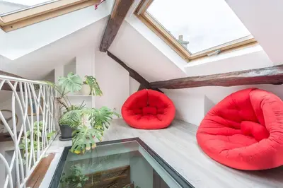 Coin salon dans l'établissement GuestReady - Appartement climatisé rue Cambon