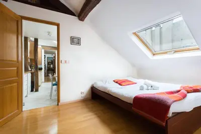 Un ou plusieurs lits dans un hébergement de l'établissement GuestReady - Appartement climatisé rue Cambon