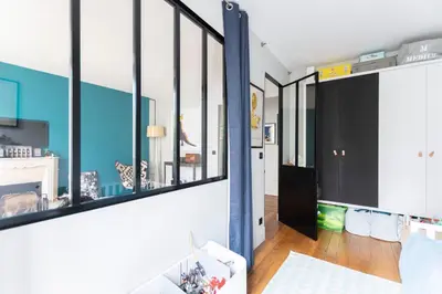 Cuisine ou kitchenette dans l'établissement GuestReady - Apt élégant au cœur d'Auteuil