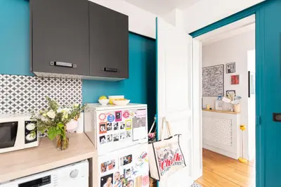 Cuisine ou kitchenette dans l'établissement GuestReady - Apt élégant au cœur d'Auteuil