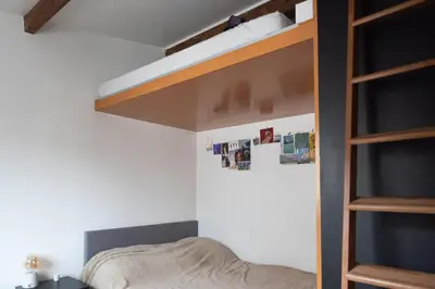Un ou plusieurs lits dans un hébergement de l'établissement Beautiful Apartment In The Heart Of Paris