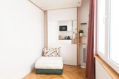 Un ou plusieurs lits dans un hébergement de l'établissement Super central mini studio - 2 pax, murphy bed