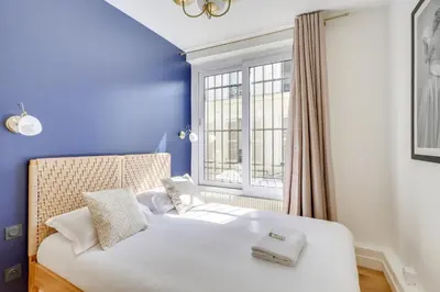 Un ou plusieurs lits dans un hébergement de l'établissement Beautiful apartment for 8 people
