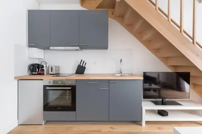 Cuisine ou kitchenette dans l'établissement Appartement Duplex de Charme proche de l'opéra Garnier