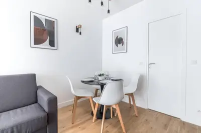 Coin salon dans l'établissement Appartement Duplex de Charme proche de l'opéra Garnier