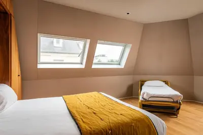Un ou plusieurs lits dans un hébergement de l'établissement Chateaudun Opéra