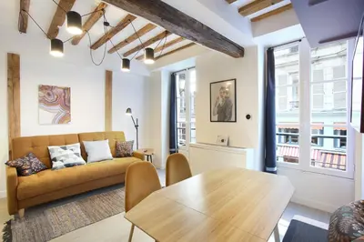 Coin salon dans l'établissement Rent a Room - Aparts CADET