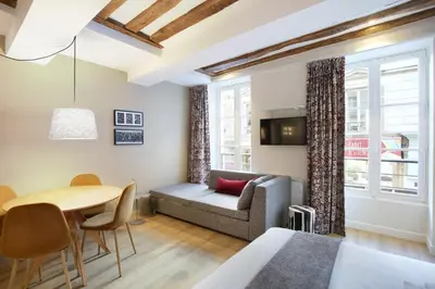 Coin salon dans l'établissement Rent a Room - Aparts CADET