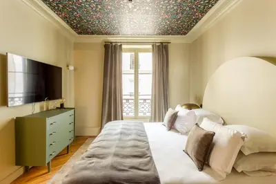 Un ou plusieurs lits dans un hébergement de l'établissement Habitat Parisien - 2BR-2BA - Marais - Centre Pompidou