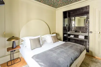 Un ou plusieurs lits dans un hébergement de l'établissement Habitat Parisien - 2BR-2BA - Marais - Centre Pompidou