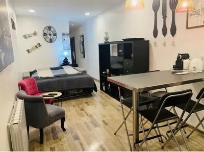 Un ou plusieurs lits dans un hébergement de l'établissement Bel appartement au cœur de paris