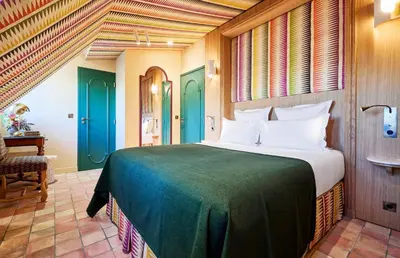 Un ou plusieurs lits dans un hébergement de l'établissement Hôtel Prince de Conti - Hôtel Rénové