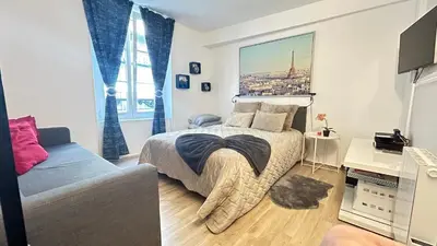 Un ou plusieurs lits dans un hébergement de l'établissement Studio Cosy à 5 minutes de la Gare de Lyon