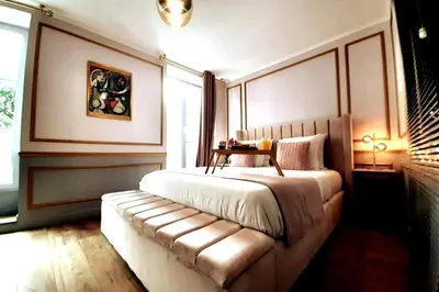 Un ou plusieurs lits dans un hébergement de l'établissement Da Vinci Apartment Paris Montmartre AirCon