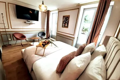 Coin salon dans l'établissement Da Vinci Apartment Paris Montmartre AirCon