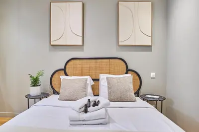 Un ou plusieurs lits dans un hébergement de l'établissement Residence centre de Paris by Studio prestige