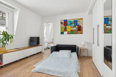 Télévision ou salle de divertissement dans l'établissement Nice apartment in the heart of Paris by Weekome