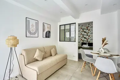 Coin salon dans l'établissement Apartement Le Marais by Studio prestige