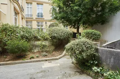Jardin de l'établissement Apartement Le Marais by Studio prestige
