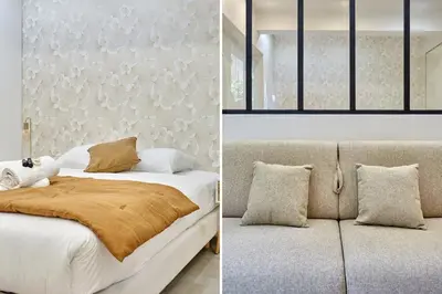 Un ou plusieurs lits dans un hébergement de l'établissement Apartement Le Marais by Studio prestige