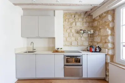 Cuisine ou kitchenette dans l'établissement GuestReady - Apt in the heart of Latin Quarter