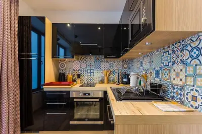 Cuisine ou kitchenette dans l'établissement Appartement de charme Gambetta Père Lachaise